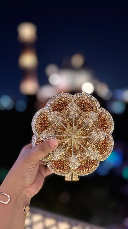 Studded customised rose clutch