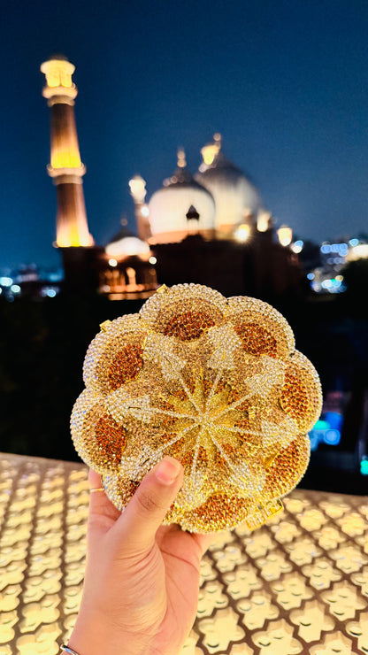 Studded customised rose clutch